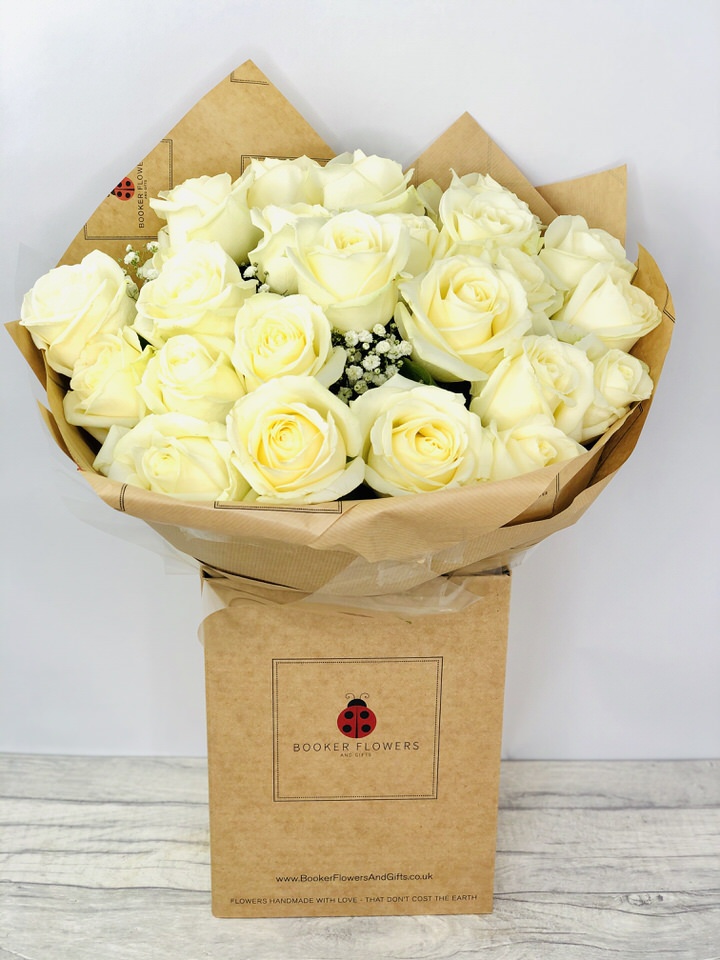 <h2>Two Dozen White Roses - Handtied Bouquet</h2>
<br>
<ul>
<li>Approximate Dimensions: 55cm x 50cm</li>
<li>Flowers arranged by hand and gift wrapped in our signature eco-friendly packaging and finished off with a hidden wooden ladybird</li>
<li>To give you the best occasionally we may make substitutes</li>
<li>Our flowers backed by our 7 days freshness guarantee</li>
<li>For delivery area coverage see below</li>
</ul>
<br>
<h2>Flower Delivery Coverage</h2>
<p>Our shop delivers flowers to the following Liverpool postcodes L1 L2 L3 L4 L5 L6 L7 L8 L11 L12 L13 L14 L15 L16 L17 L18 L19 L24 L25 L26 L27 L36 L70 If your order is for an area outside of these we can organise delivery for you through our network of florists. We will ask them to make as close as possible to the image but because of the difference in stock and sundry items it may not be exact.</p>
<br>
<h2>Hand-tied Bouquet | 24 White Roses</h2>
<p>These beautiful roses hand-arranged by our professional florists into a hand-tied bouquet are a delightful choice. This bouquet of two dozen white roses would make the perfect gift to celebrate an Anniversary.</p>
<p>Handtied bouquets are a lovely display of fresh flowers that have the wow factor. The advantage of having a bouquet made this way is that they are artfully arranged by our florists and tied so that they stay in the display.</p>
<p>They are then gift wrapped and aqua packed in a water bubble so that at no point are the flowers out of water. This means they look their very best on the day they arrive and continue to delight for days after.</p>
<p>Being delivered in a transporter box and in water means the recipient does not need to put the flowers in a vase straight away they can just put them down and enjoy.</p>
<p>Featuring 24 large-headed white roses together with mixed seasonal foliages.</p>
<br>
<h2>Eco-Friendly Liverpool Florists</h2>
<p>As florists we feel very close earth and want to protect it. Plastic waste is a huge problem in the florist industry so we made the decision to make our packaging eco-friendly.</p>
<p>To achieve this we worked with our packaging supplier to remove the lamination off our boxes and wrap the tops in an Eco Flowerwrap which means it easily compostable or can be fully recycled.</p>
<p>Once you have finished enjoying your flowers from us they will go back into growing more flowers! Only a small amount of plastic is used as a water bubble and this is biodegradable.</p>
<p>Even the sachet of flower food included with your bouquet is compostable.</p>
<p>All our bouquets have small wooden ladybird hidden amongst them so do not forget to spot the ladybird and post a picture on our social media pages to enter our rolling competition.</p>
<br>
<h2>Flowers Guaranteed for 7 Days</h2>
<p>Our 7-day freshness guarantee should give you confidence that we will only send out good quality flowers.</p>
<p>Leave it in our hands we will create a marvellous bouquet which will not only look good on arrival but will continue to delight as the flowers bloom.</p>
<br>
<h2>Liverpool Flower Delivery</h2>
<p>We are open 7 days a week and offer advanced booking flower delivery same-day flower delivery 3-hour flower delivery. Guaranteed AM PM or Evening Flower Delivery and also offer Sunday Flower Delivery.</p>
<p>Our florists deliver in Liverpool and can provide flowers for you in Liverpool Merseyside. And through our network of florists can organise flower deliveries for you nationwide.</p>
<br>
<h2>The Best Florist in Liverpool your local Liverpool Flower Shop</h2>
<p>Come to Booker Flowers and Gifts Liverpool for your beautiful flowers and plants. For that bit of extra luxury we also offer a lovely range of finishing touches such as wines champagne locally crafted Gin and Rum Vases Scented Candles and Chocolates that can be delivered with your flowers.</p>
<p>To see the full range see our extras section.</p>
<p>You can trust Booker Flowers and Gifts of delivery the very best for you.</p>
<p><br /><br /></p>
<p><em>5 Star review on Yell.com</em></p>
<br>
<p><em>Thank you Gemma for your fabulous service. The flowers are of the highest quality and delivered with a warm smile. My sister was delighted. Ordering was simple and the communications were top-notch. I will definitely use your services again.</em></p>